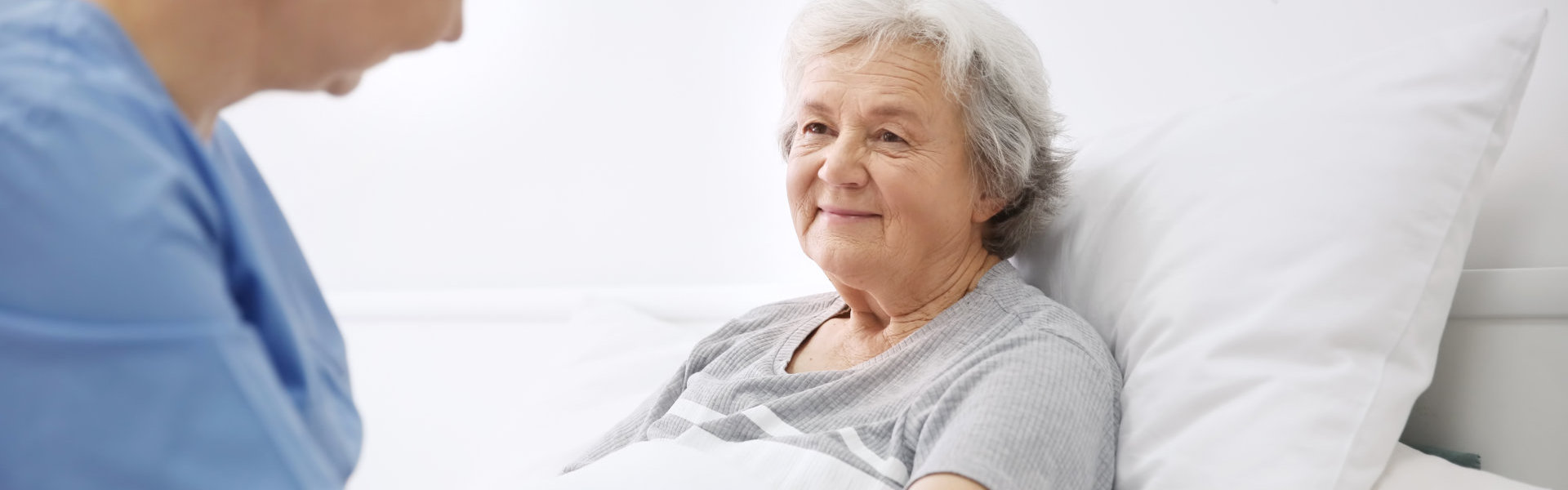 patient having talk with female caregiver