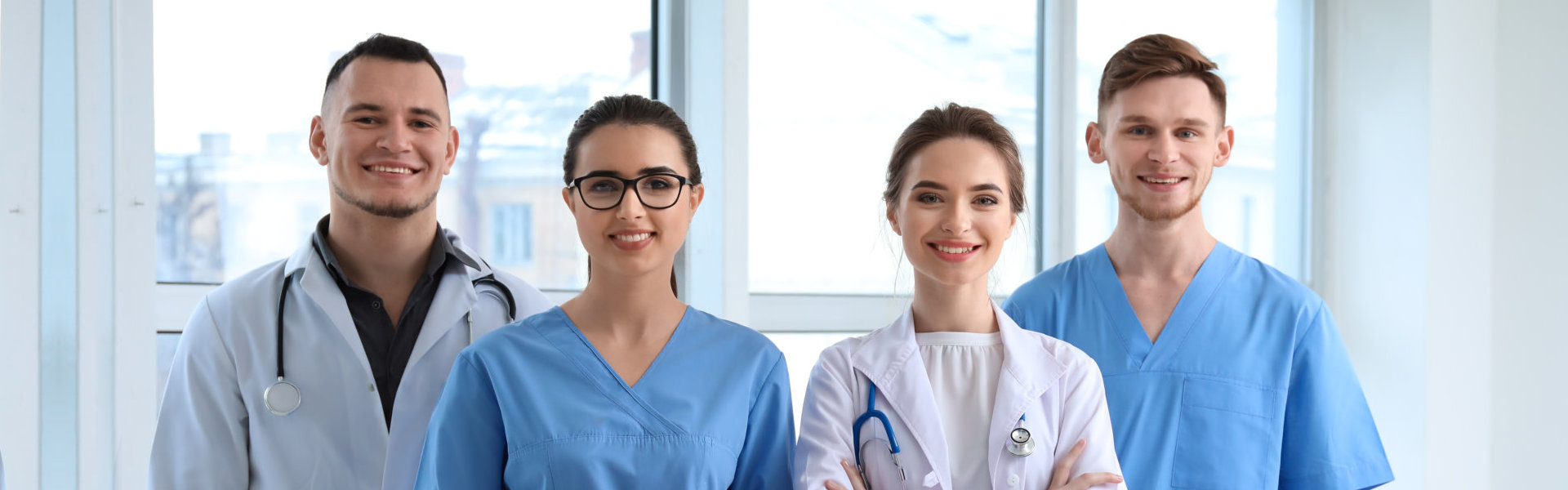 Caregivers and nurses smiling