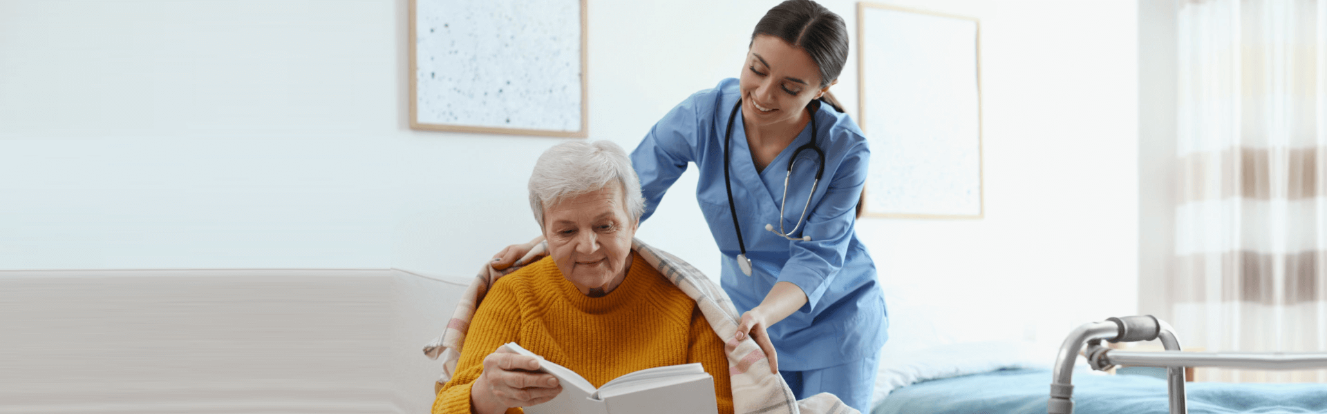 Woman caring for the elderly as she reads a book